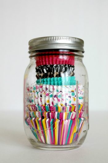 There is nothing worse than having a messy pantry. These pantry organizers will help transform your pantry. Keep your cupcake tins in a mason jar to keep them free of dust. 