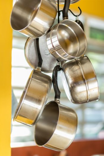 If you're looking for a better way to store pots and pans, you've come to the right place! Check out these tips on how to store pots and pans and enjoy your organized kitchen! 