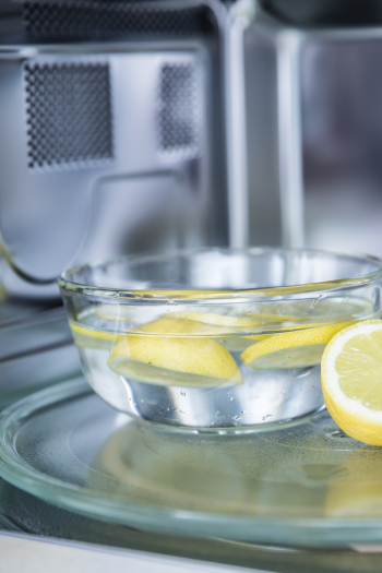 Clean the microwave with lemon and have the clean interior you want in no time! Lemon, heat, and steam make it easier to clean your microwave. You will love the results! 