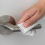 Homemade disinfectant wipe used to clean a doorknob